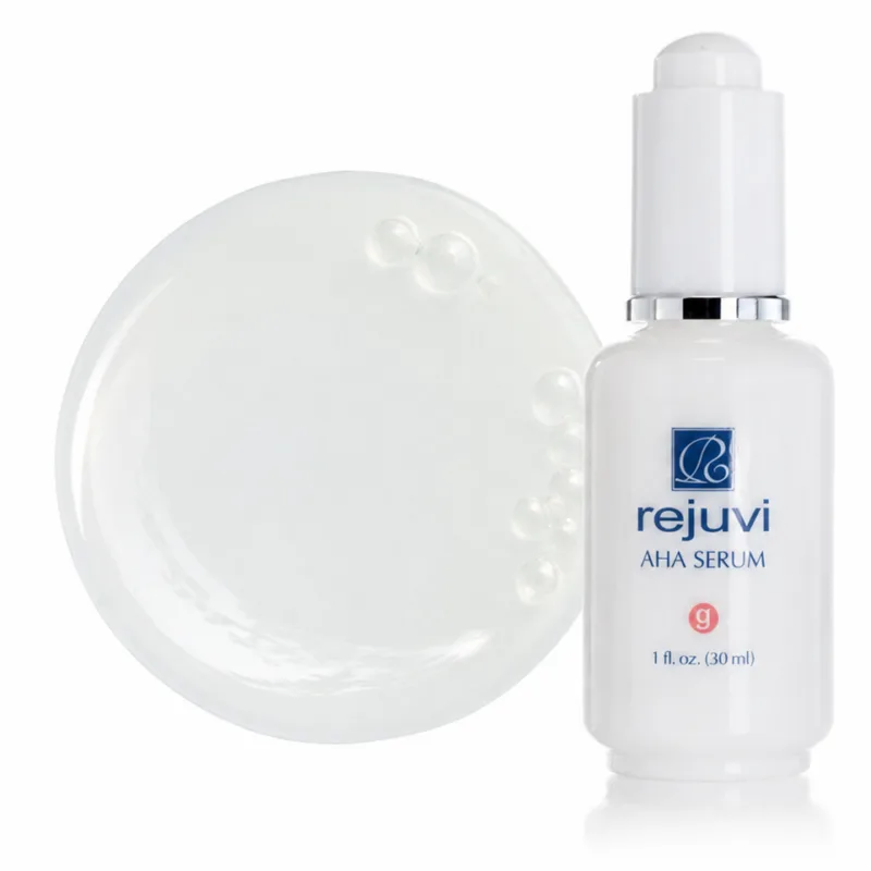Rejuvi g AHA Serum bottle beside clear gel texture