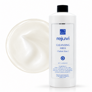 Rejuvi o Milk Cleanser 32 oz salon bottle with upward cleanser swatch